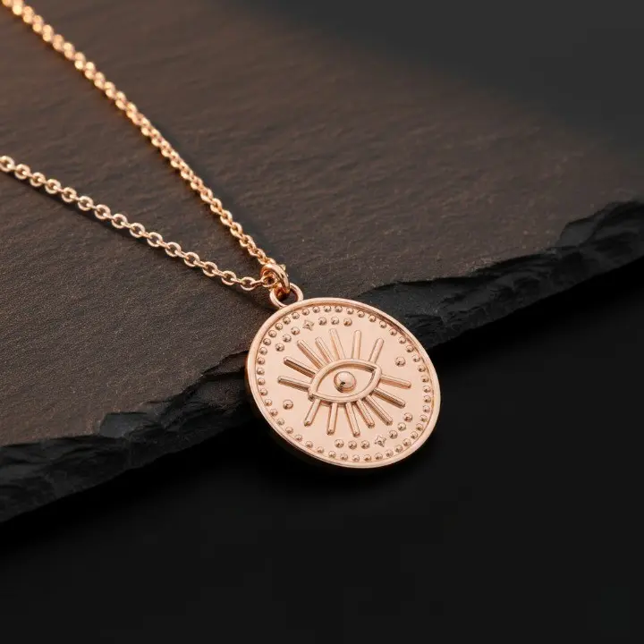 925 sterling silver rose gold-plated all-seeing eye coin necklace close-up detail